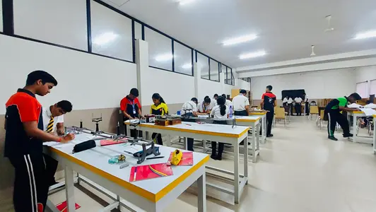 Students working in the physics laboratory at Asian International School